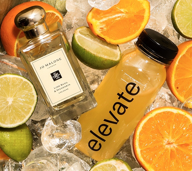 Jo Malone London Lime Basil & Mandarin Cologne and Elevate Juice in ice with orange and limes