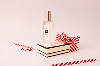 Jo Malone London Christmas 30ml English Pear & Freesia on gift box with red stripy ribbon