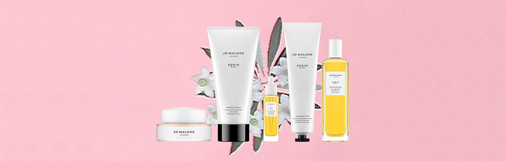 rodin collaboration, pink background with line up of 5 skincare products