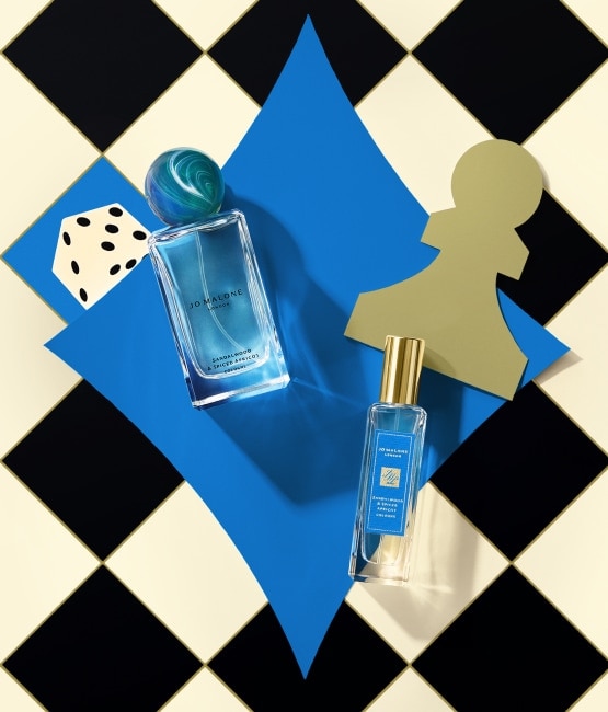 Jo Malone London Sandalwood & Spiced Apricot Cologne 100ml and 30ml on blue and checkered background