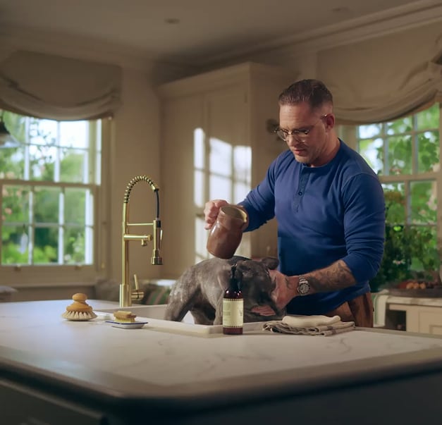 Tom Hardy washing Blue Hardy, his french bulldog, with Jo Malone London Wildwash Dog Shampoo.