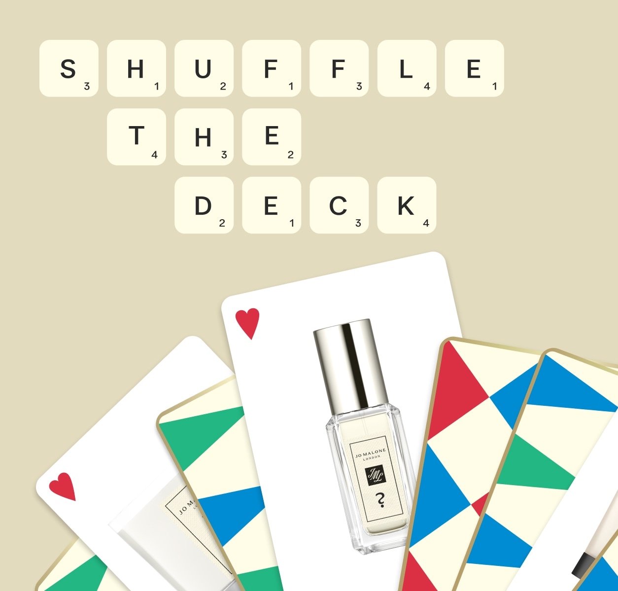 Christmas Card Game with deck of cards and 'Shuffle The Deck' in scrabble tiles