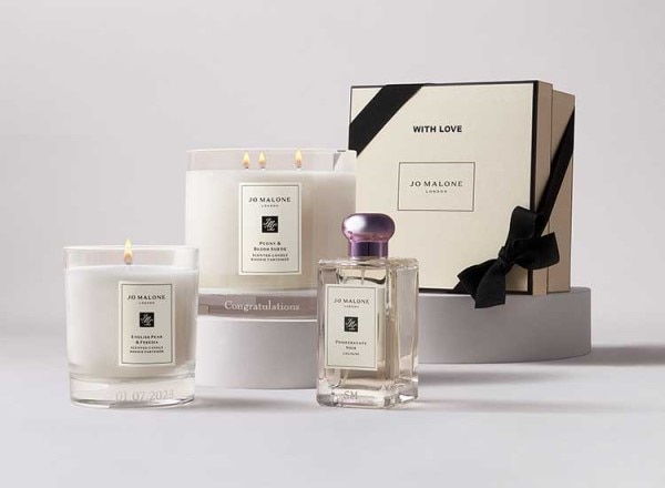 Jo Malone London bestselling home candle 200g, deluxe candle 600g and 100ml cologne topped with a pink cap.