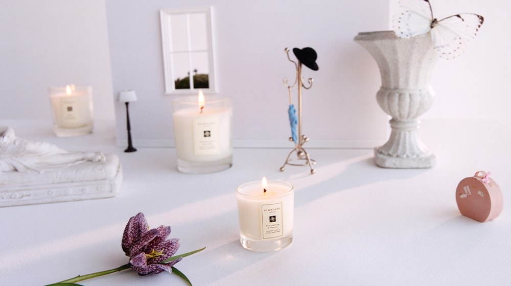 Jo Malone London Miniature Candle with larger Classic Candle behind