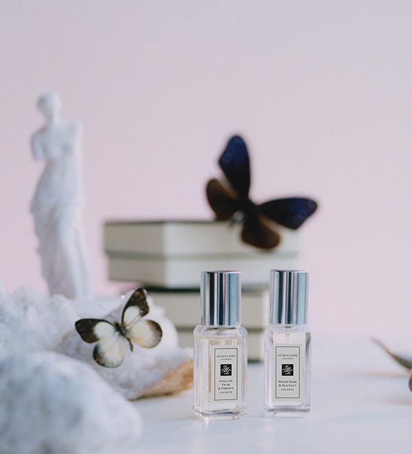 Jo Malone London 9ml colognes surrounded by butterflies